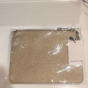 Brand new unopened Jules Kae Copper Clutch